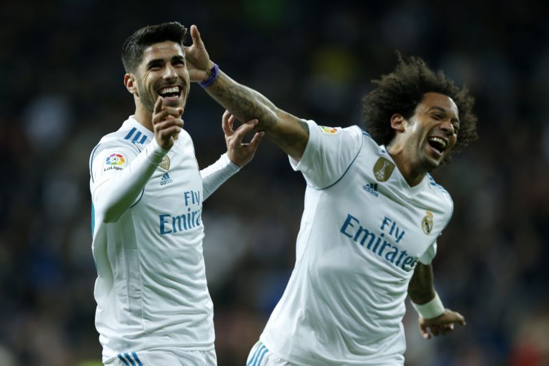 Brazilský fotbalista Marcelo (vpravo).
