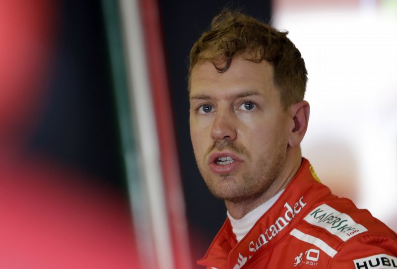 Závodník formule 1 Sebastian Vettel. 