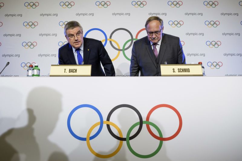 Thomas Bach a Samuel Schmid.
