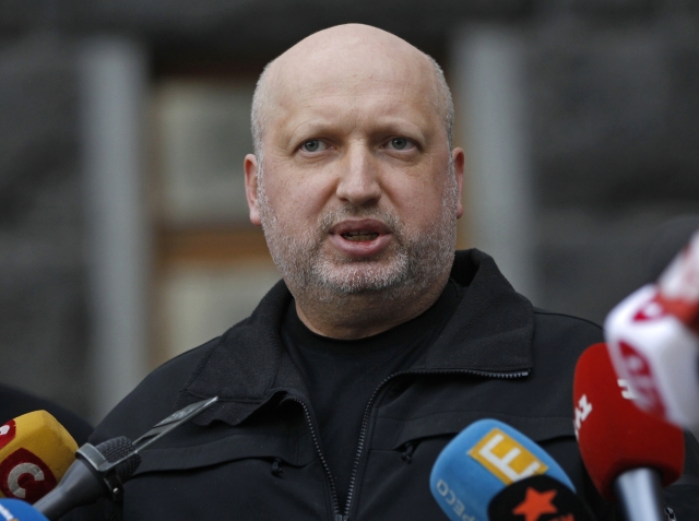 Šéf bezpečnostní rady Oleksandr Turčynov. Šéf bezpečnostní rady Oleksandr Turčynov.