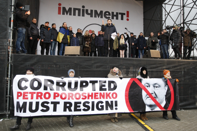 Fotografie z lednového protestu proti prezidentovi Ukrajiny. Fotografie z lednového protestu proti prezidentovi Ukrajiny.