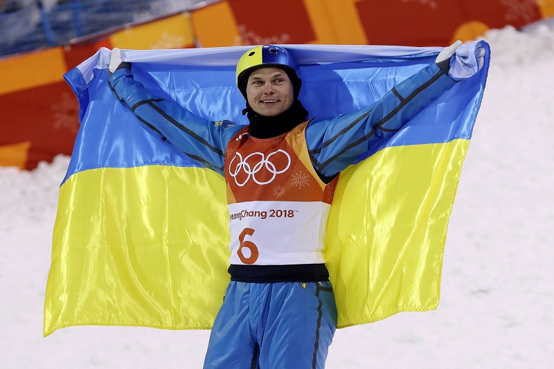 Lyžař Oleksander Abramenko, první ukrajinský medailista.