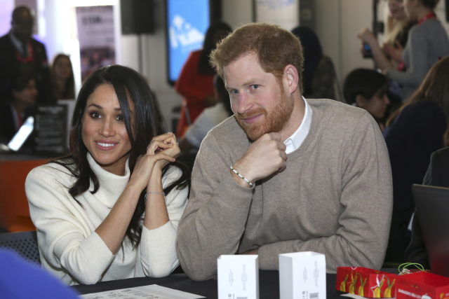 Princ Harry se svou snoubenkou Meghan Markelovou. Princ Harry se svou snoubenkou Meghan Markelovou.