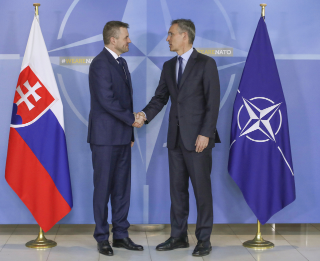Slovenský premiér P. Pellegrini (vlevo) a J. Stolenberg. 