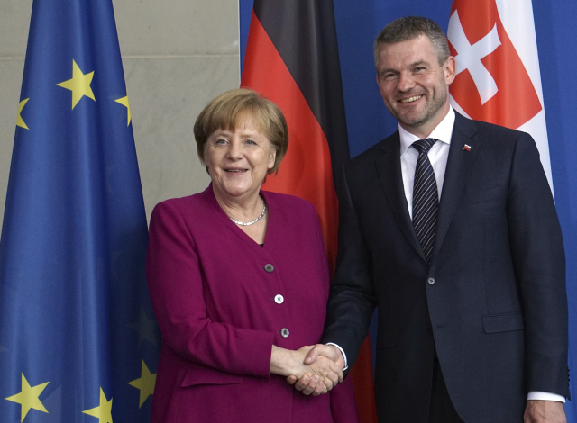 Německá kancléřka Angela Merkelová a slovenský premiér Peter Pellegrini.