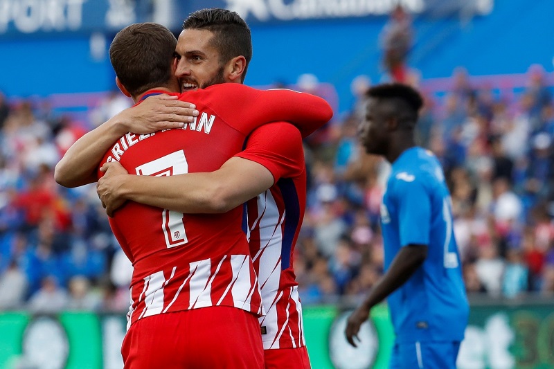 Hráči Atlética se radují po jediné trefě proti Getafe.