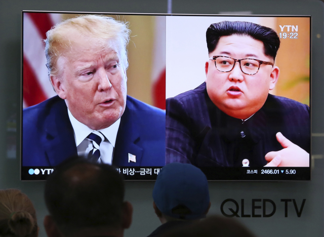 Zleva Donald Trump a Kim Čong-un.