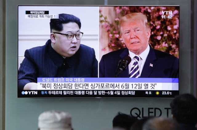 Donald Trump (vpravo) a Kim Čong-un. 