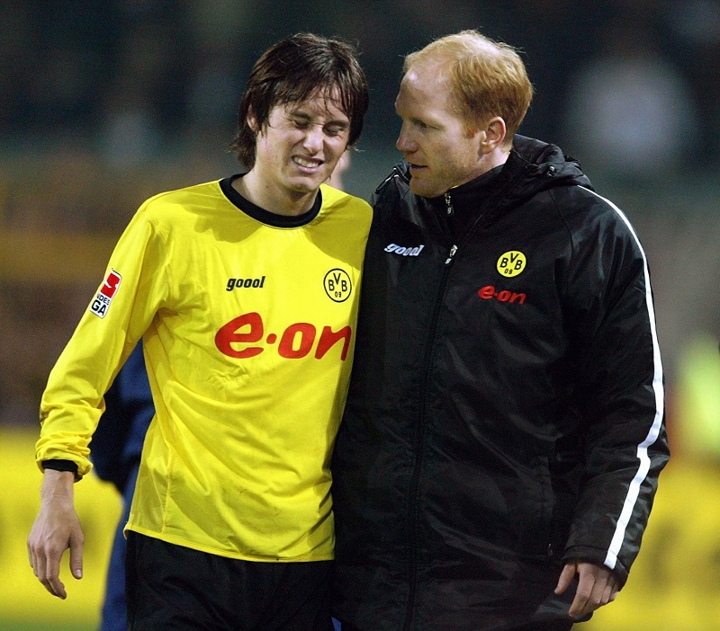 Tomáš Rosický a Matthias Sammer v Dortmundu.