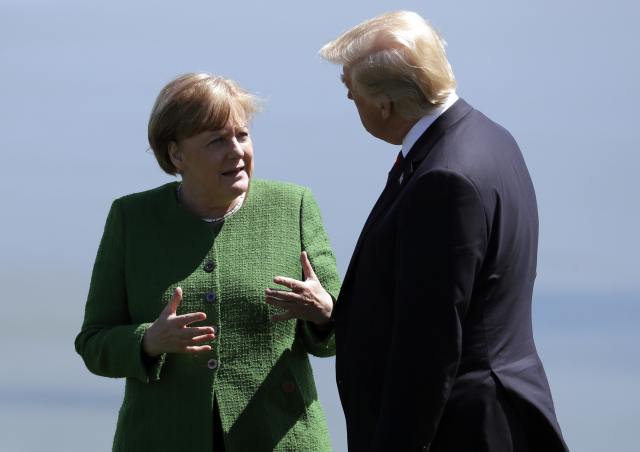 Angela Merkelová s Donaldem Trumpem. Angela Merkelová s Donaldem Trumpem.