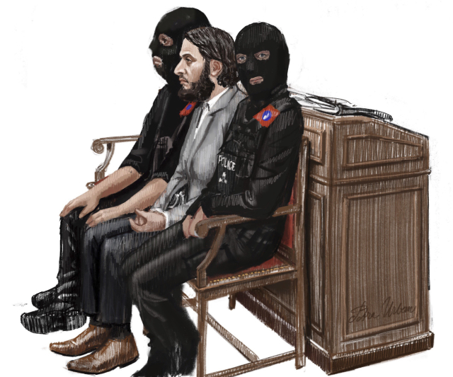 Islamista Salah Abdeslam (uprostřed) během soudního procesu. 