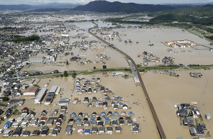 Zaplavené domy ve městě Kurashiki. Zaplavené domy ve městě Kurashiki.