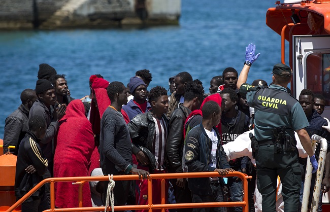Migranti ve Španělsku.
