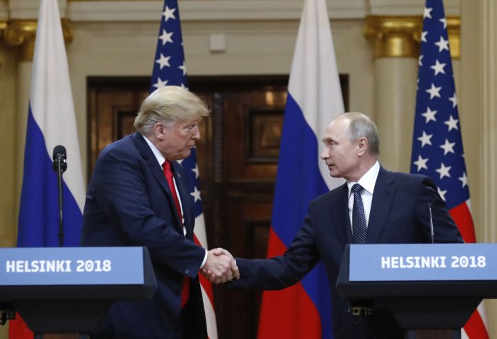 Donald Trump (vlevo) a Vladimir Putin.