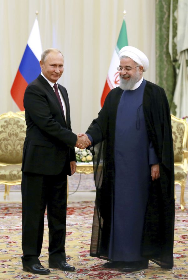 Ruský prezident Vladimir Putin a íránský prezident Hasan Rúhání.