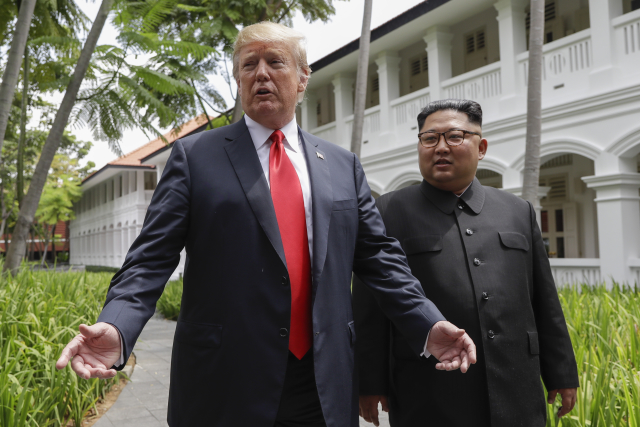 Americký prezident Donald Trump a vůdce KLDR Kim Čong-un.