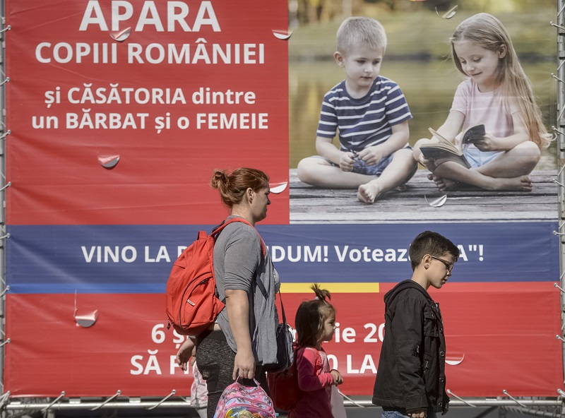 Přijďte hlasovat! vyzývá billboard v Rumunsku.