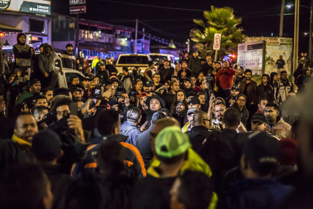 Protestující migranti v mexickém městě Tijuana.