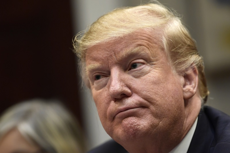 Šance na dohodu o stavbě protiimigrační zdi jsou přinejlepším 50 na 50, ale spíš méně, přiznává Donald Trump (na snímku).