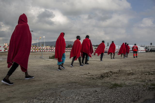 Migranti ve Španělsku.