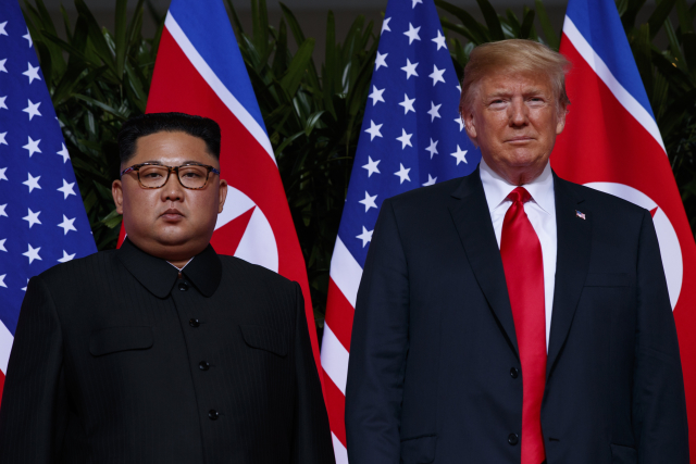 Americký prezident Donald Trump (vlevo) a severokorejský vůdce Kim Čong-un.