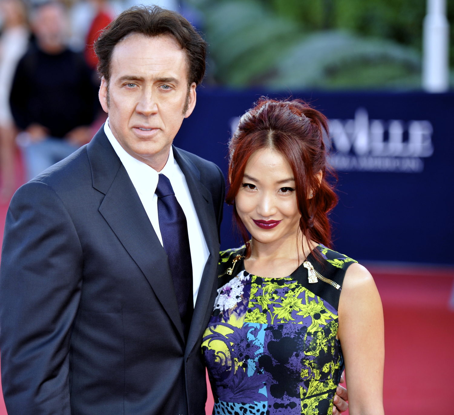 Nicolas Cage a Alice Kim. Nicolas Cage a Alice Kim.