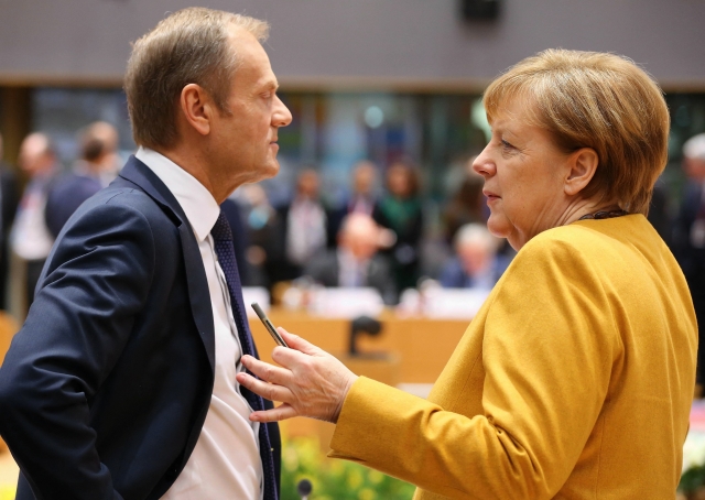 Donald Tusk na snímku s německou kancléřkou Angelou Merkelovou.