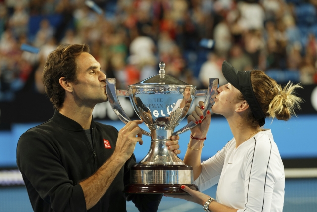 Švýcaři Roger Federer s Belindou Bencicovou.