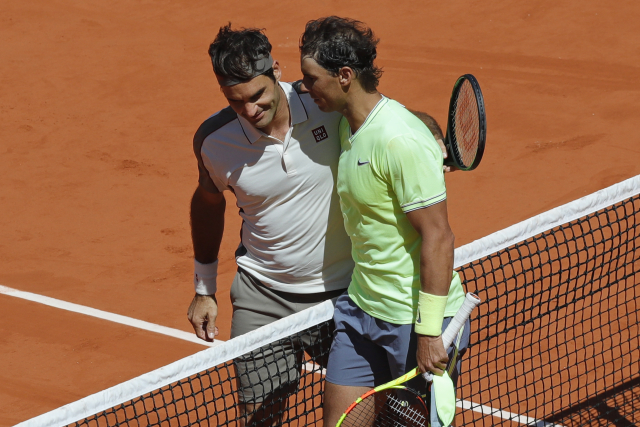 Roger Federer (vlevo) a Rafael Nadal.