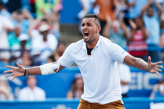 Radující se Nick Kyrgios. 