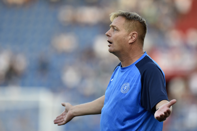 Trenér Stanislav Hejkal. 