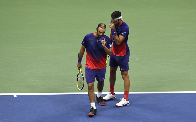 Robert Farah (vpravo) se svým parťákem Cabalem ovládl US Open.
