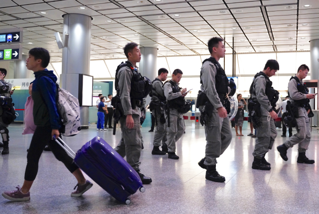 Hongkongská policie.