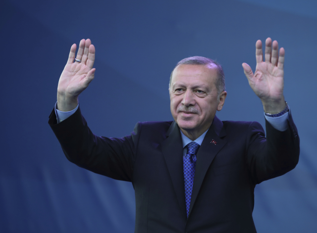 Mávající turecký prezident Recep Tayyip Erdogan.