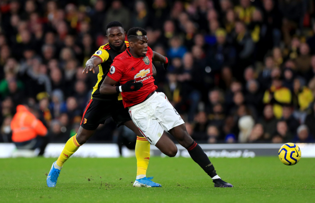 Paul Pogba (v červeném) proti Watfordu.