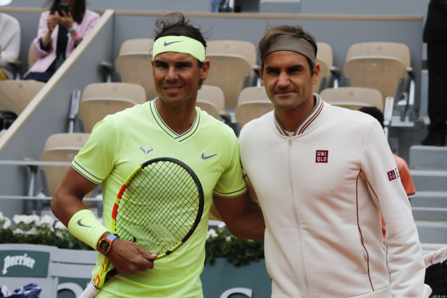 Roger Federer (vpravo) vedle Rafaela Nadala.