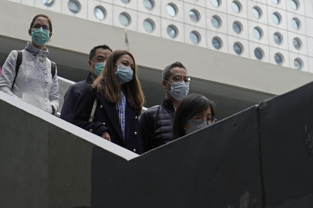 Obyvatelé Hongkongu. 