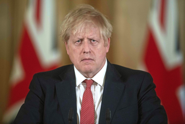 Premiér Johnson.