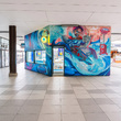 Traficon proměnil prodejnu u metra Háje v městský landmark. Fasádu ozdobil originální mural 