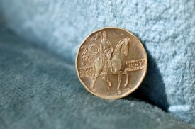 Dolar za více než dvacet korun