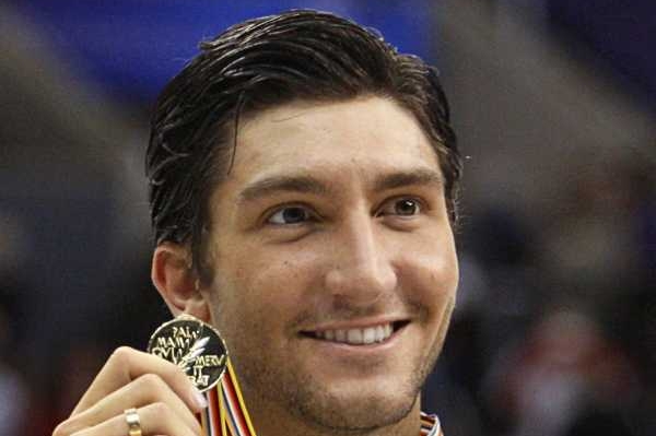 Zlatý medailista krasobruslař Evan Lysacek.