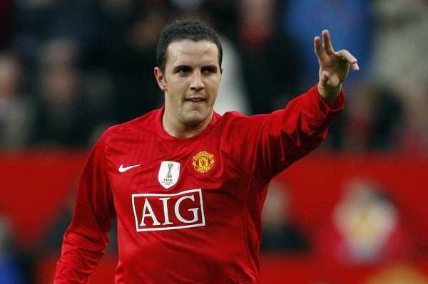 John O'Shea oslavuje vstřelenou branku do sítě Arsenalu.