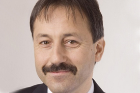 Předseda školského výboru sněmovny Walter Bartoš.