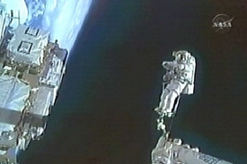 Astronaut při práci. Astronaut při práci.