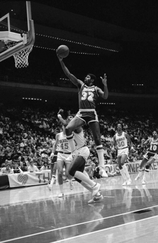 Johnson byl pro NBA v 80. letech sp&aacute;sou.