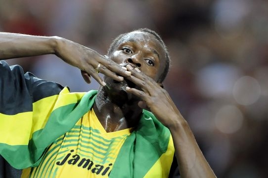 Usain Bolt po vyhraném závodu na 100 m.