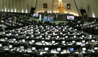 Schv&aacute;l&iacute; &iacute;r&aacute;nsk&yacute; parlament prezidentem navrhovanou vl&aacute;du?