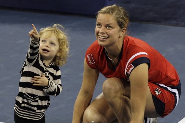 Kim Clijstersová s dcerou Jade po triumfu na US Open.