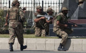 Voj&aacute;ci osvobozuj&iacute; 'p&aacute;kist&aacute;nsk&yacute; Pentagon'.