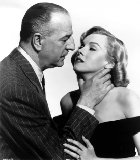 Marilyn Monroe a Louis Calhern v Asfaltové džungli. Marilyn Monroe a Louis Calhern v Asfaltové džungli.